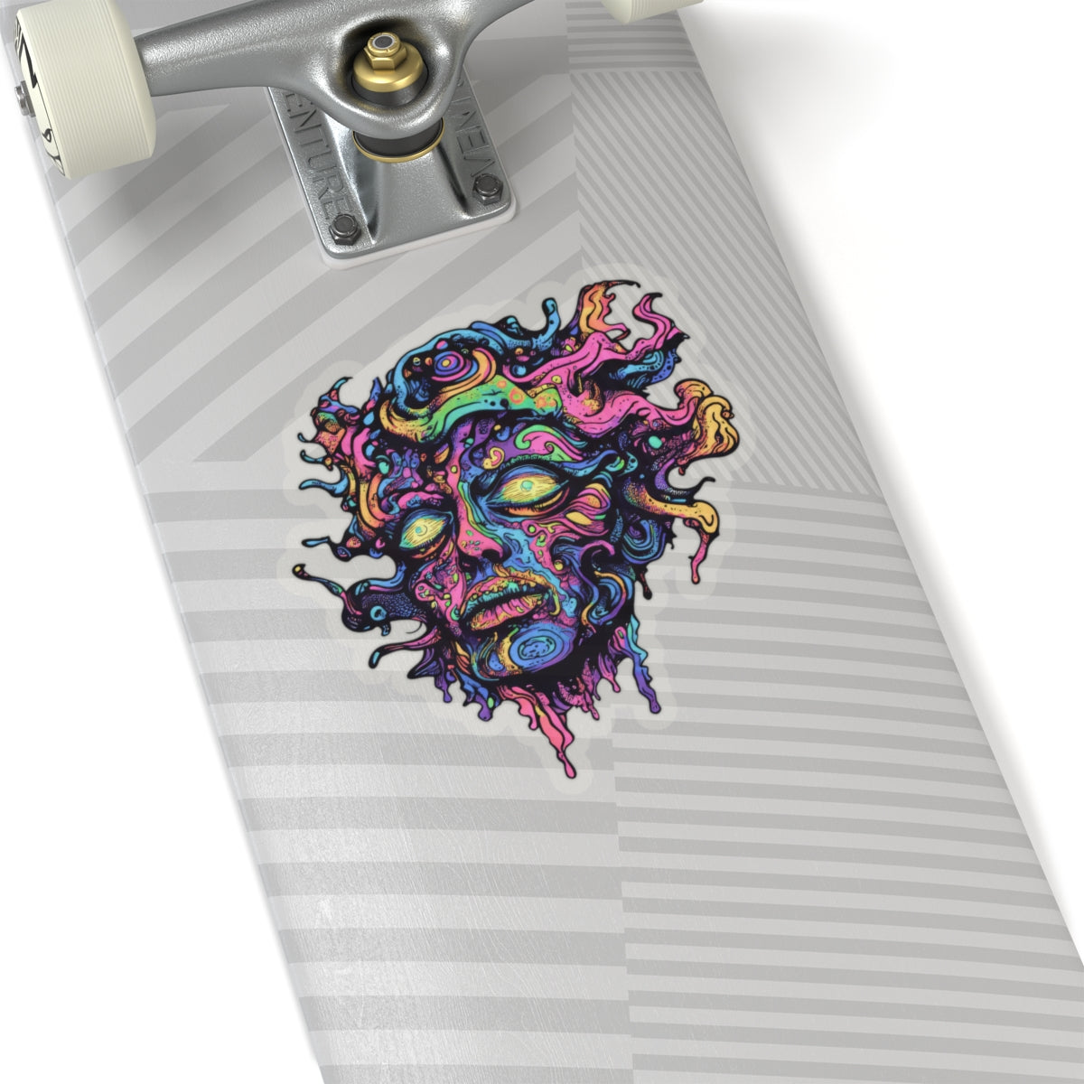 Psychedelic melting face sticker on a skateboard deck.