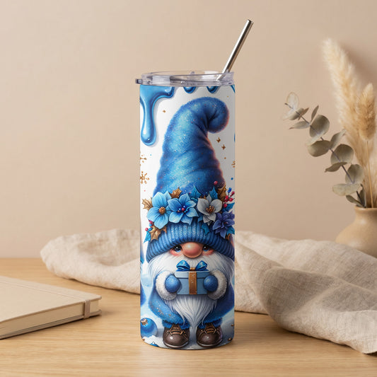 Tumbler with blue gnome design holding a gift, wearing a floral hat.