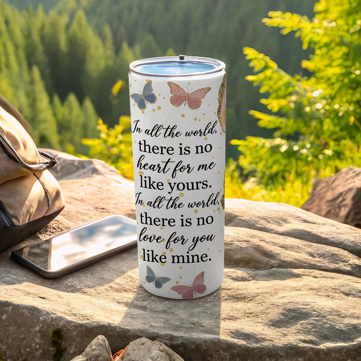 White tumbler with butterflies and text "In all the world, there is no heart for me like yours."