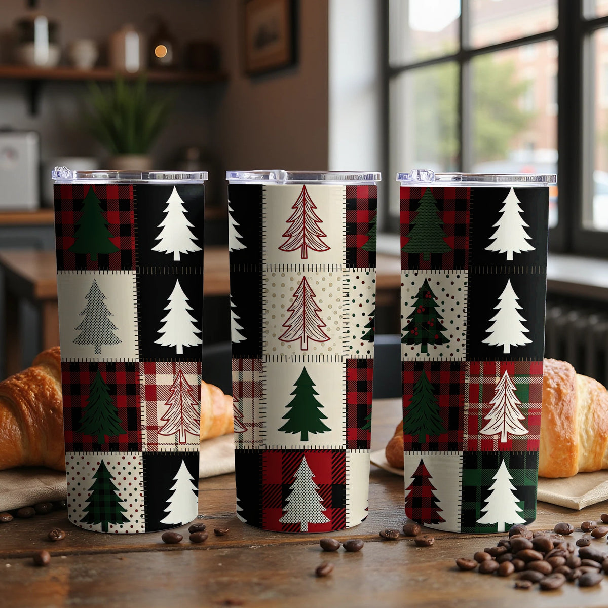 Three tumblers with a patchwork of Christmas trees and plaid patterns.