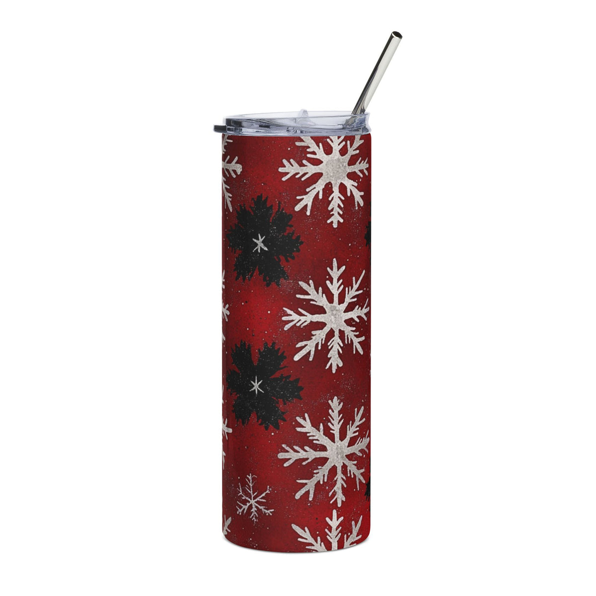 Red tumbler with a white and black snowflake pattern and a silver straw.