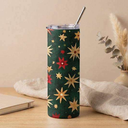 Tumbler with a dark green background and a scattered pattern of gold and red stars.