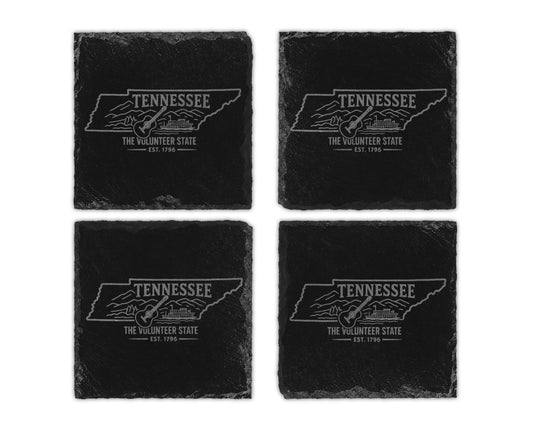 Four black slate coasters featuring Tennessee outline with guitar and steamboat graphic.