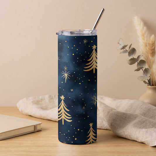 Dark blue tumbler with gold Christmas trees and stars, silver straw.