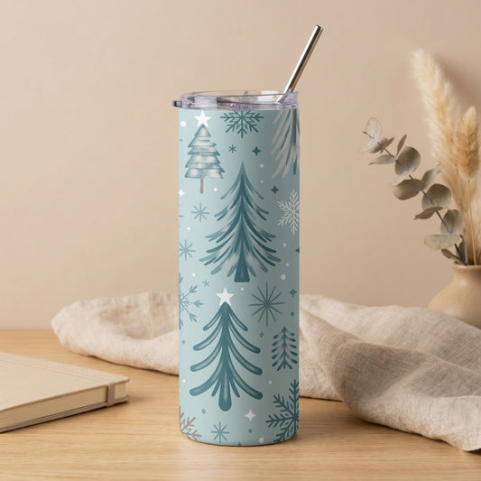 Blue tumbler with Christmas tree and snowflake pattern and metal straw