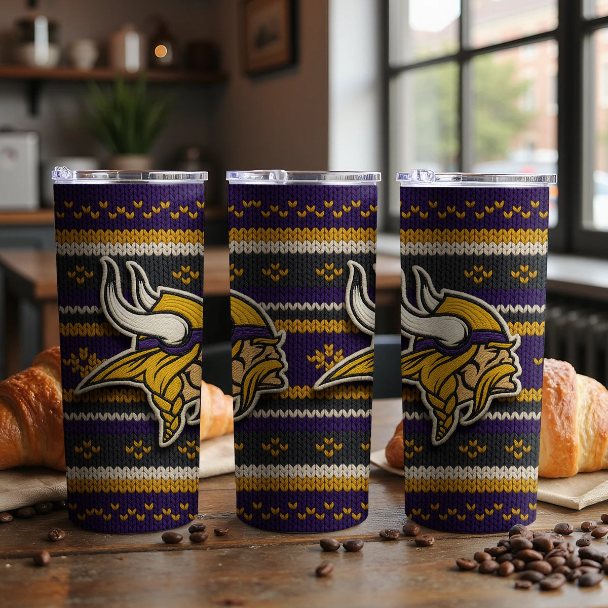 Minnesota Vikings tumbler with a purple, black, white, and gold knit pattern.