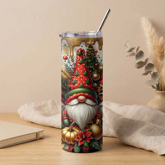 Christmas gnome design tumbler with plaid, poinsettia, pumpkin, and pine tree accents.