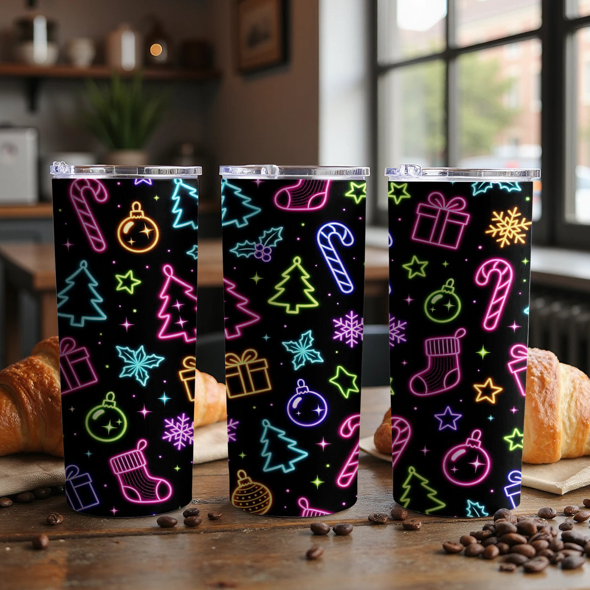Three tumblers with a black background and neon Christmas pattern of trees, stockings, and ornaments.