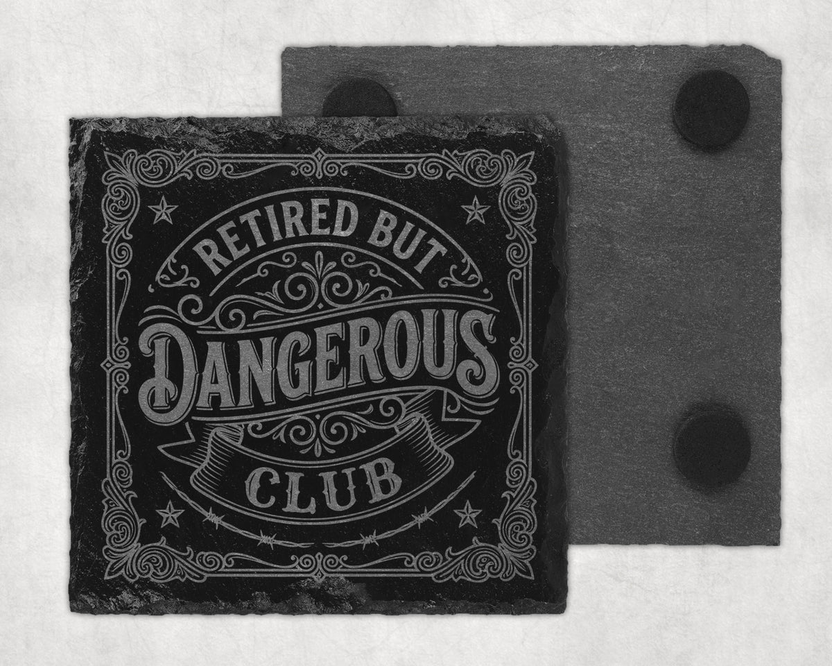 Slate coaster with engraved text "Retired But Dangerous Club".