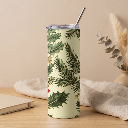 Tall tumbler with a cream background and a vintage holly and pine branch pattern.