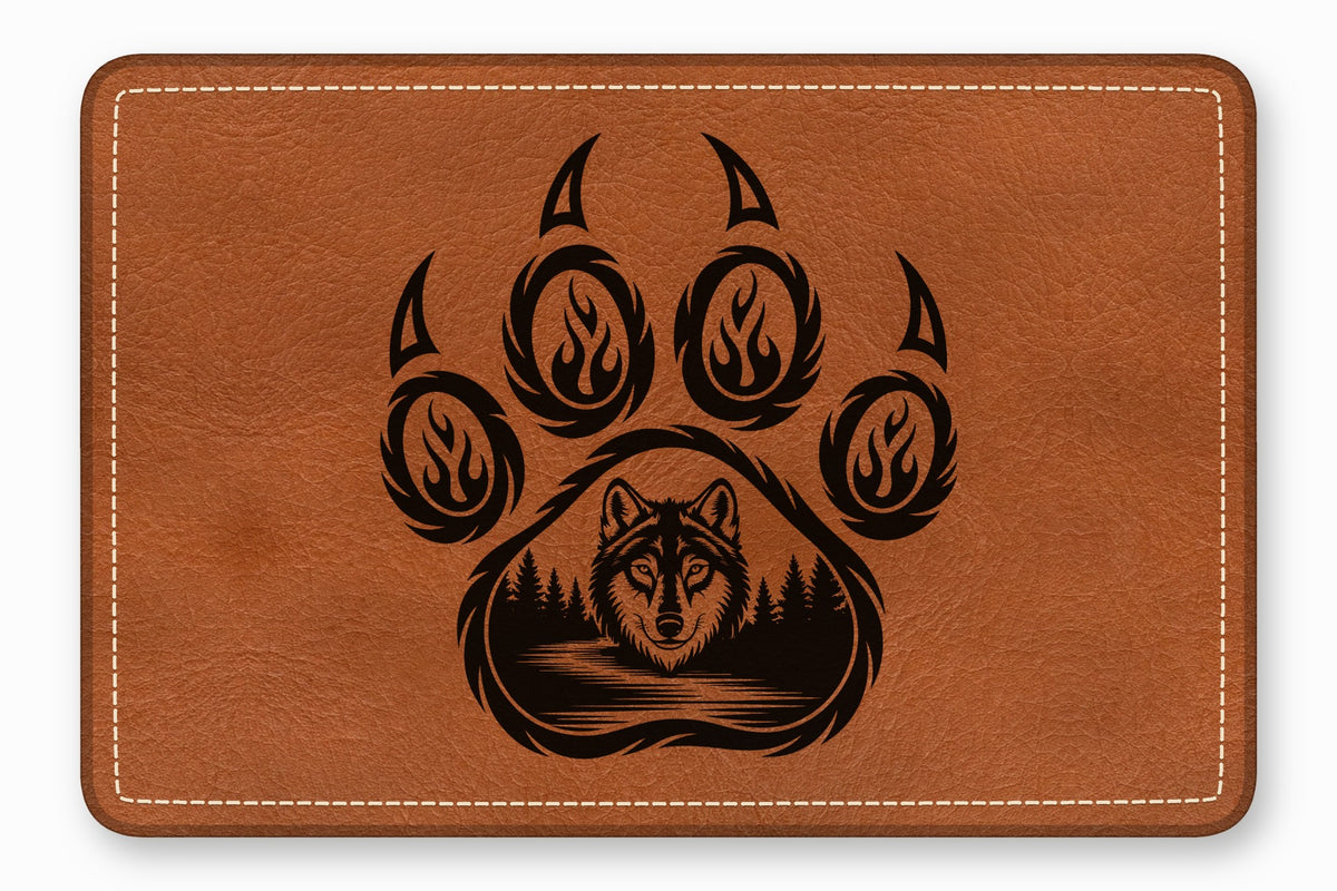 Brown leather patch with rounded corners and white stitching, featuring a black wolf in a forest paw print graphic.
