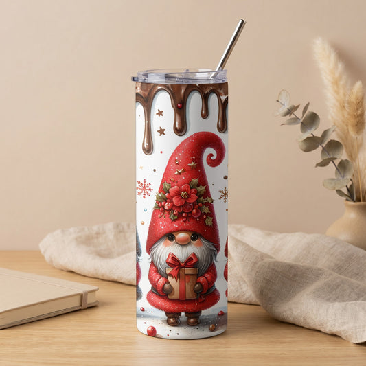 A tall tumbler with a Christmas gnome design and a chocolate drizzle pattern.
