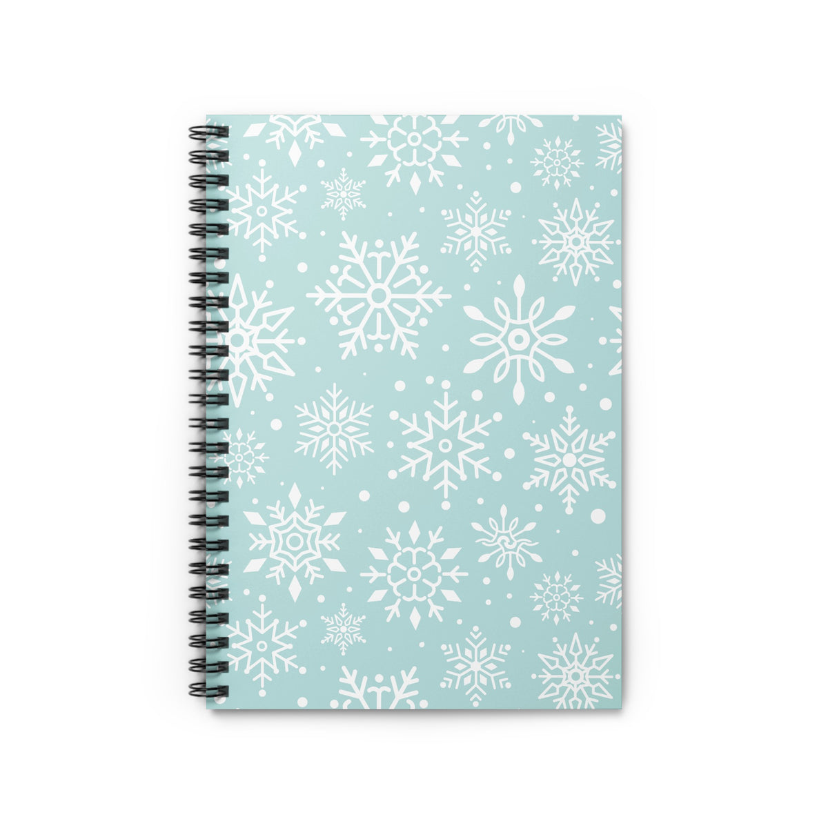 Spiral-bound notebook with a light blue cover patterned with white snowflakes.