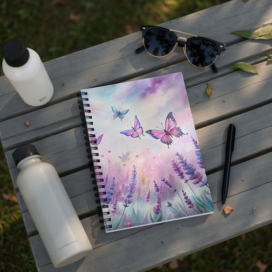 Spiral-bound notebook with a watercolor painting of lavender and butterflies.