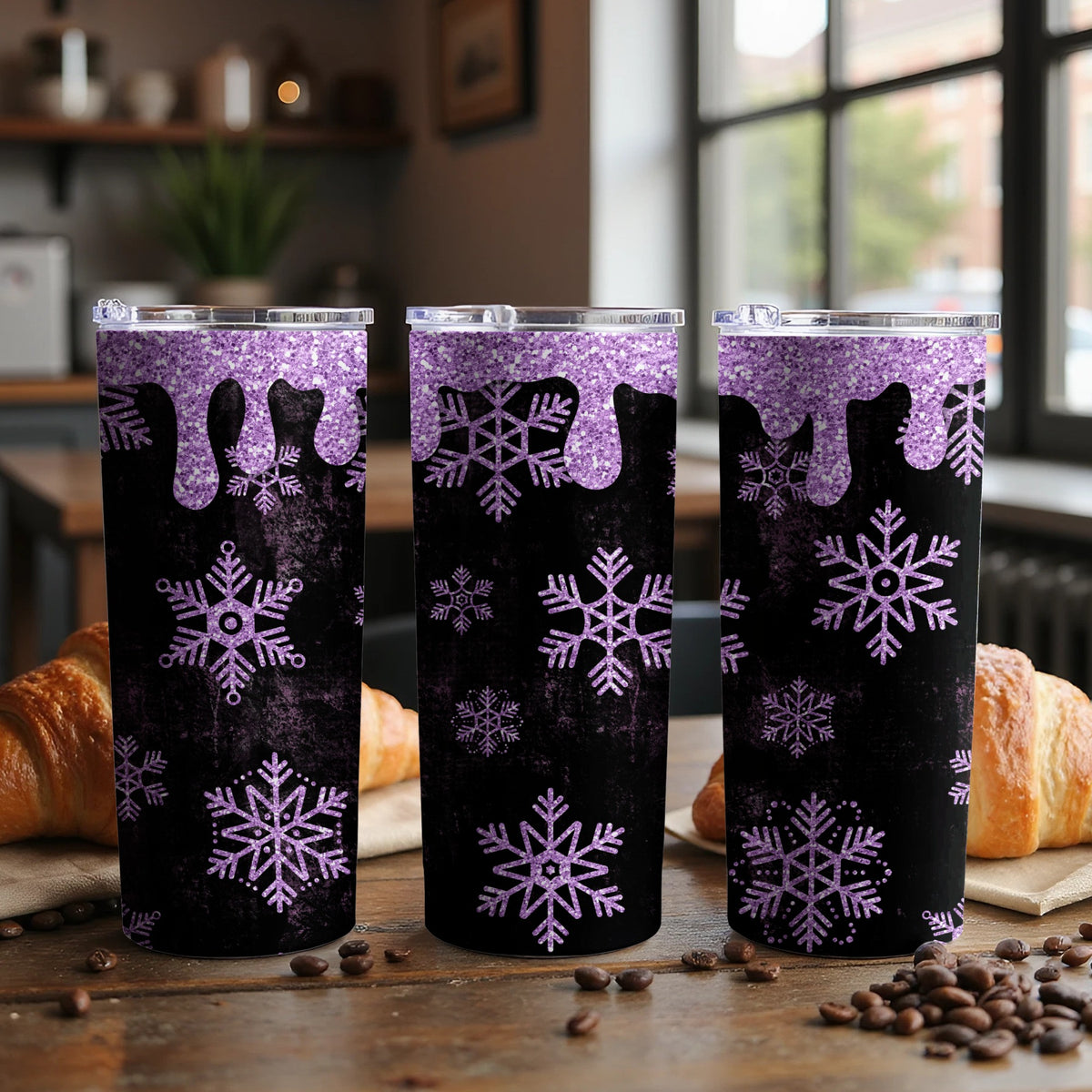 Three tumblers with purple glitter drips and snowflakes on a black background.
