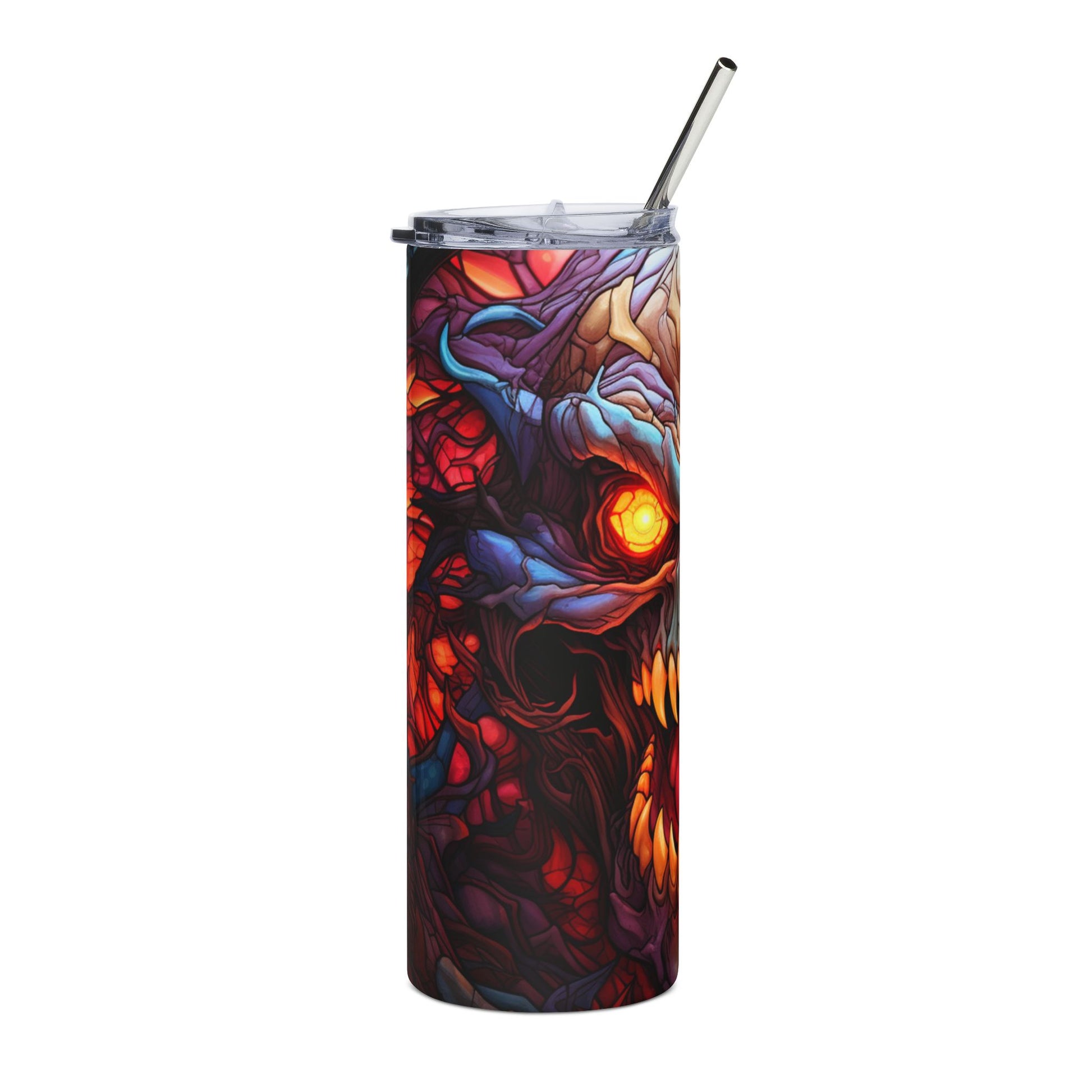 Tall tumbler with a spooky monster design and a metal straw.