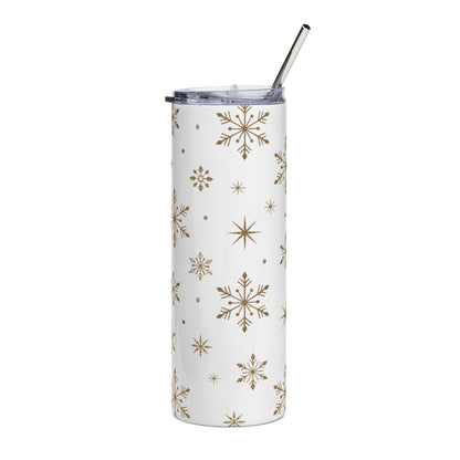 White tumbler with gold snowflake pattern and metal straw.