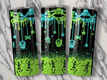 Three tumblers with neon green and blue dripping skulls, bones, ghosts, stars, and dancing skeletons.