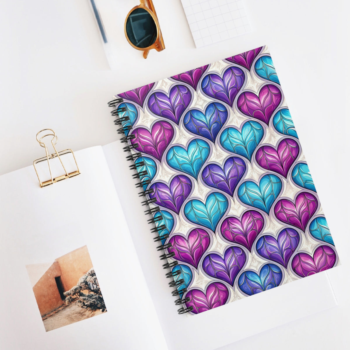 Notebook with colorful stained-glass hearts pattern on cover
