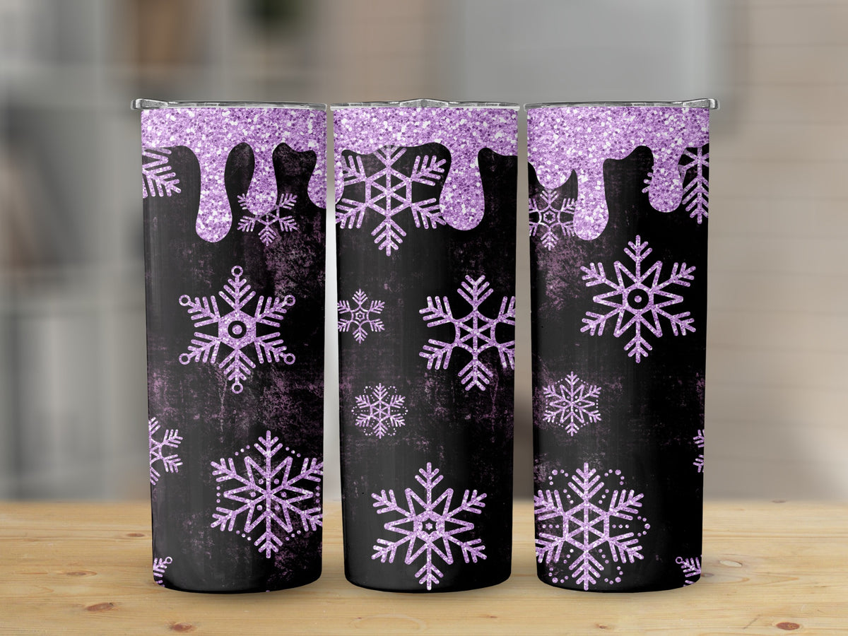 Three tumblers with black background, purple glitter drip top, and purple snowflake designs.