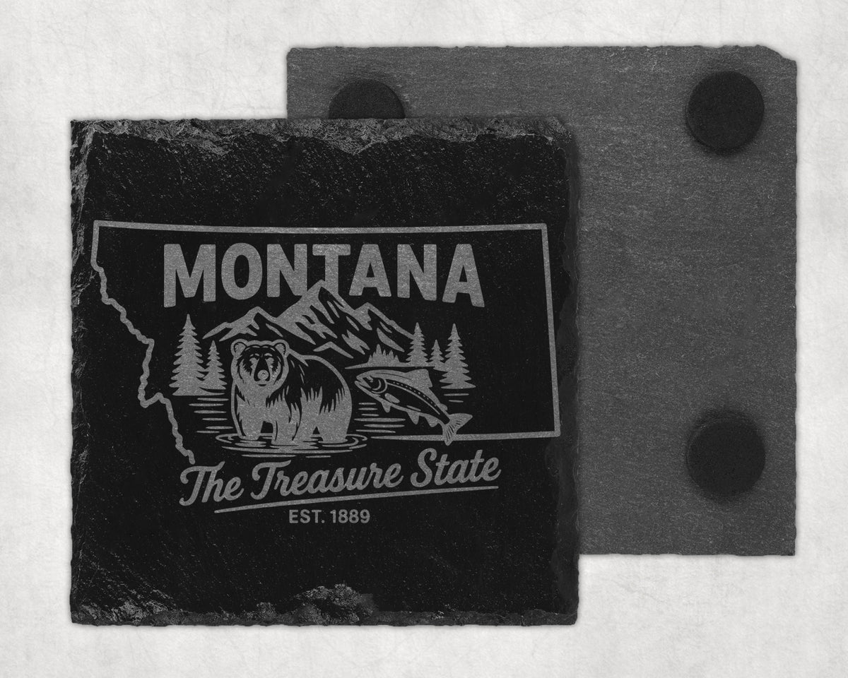 Montana state map etched on a dark slate coaster with bear, fish, and mountains.