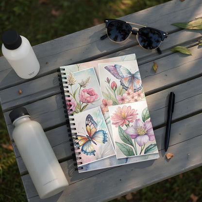 Spiral-bound notebook with watercolor butterflies and floral illustrations.