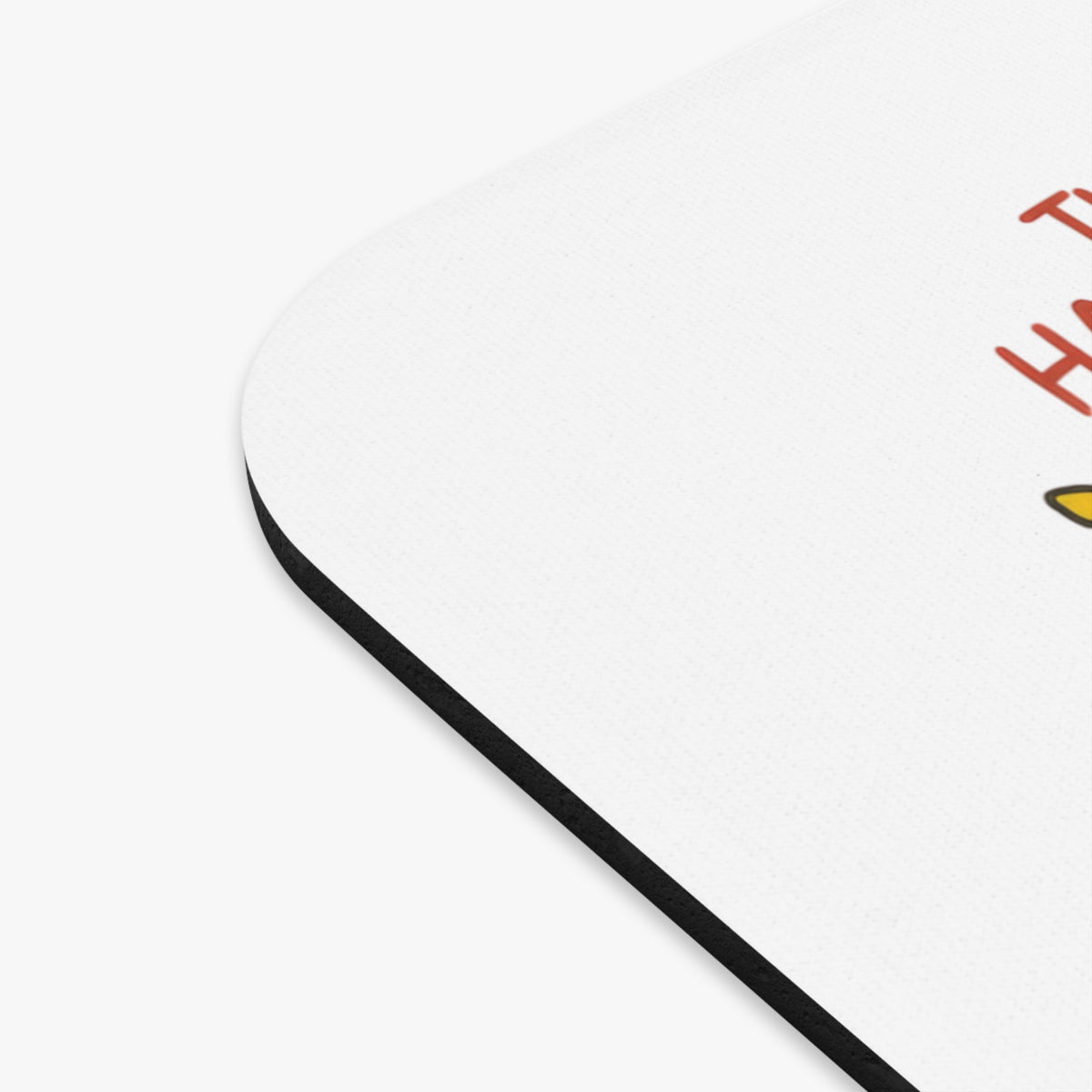 Mousepad with red text "This is my happy place" and a cartoon bee.