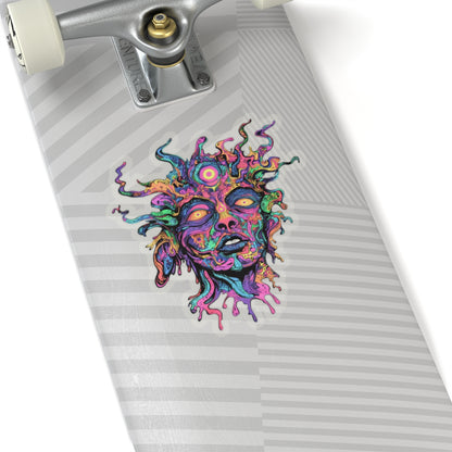 Vibrant, abstract face sticker with flowing lines and multiple eyes on a grey striped surface.