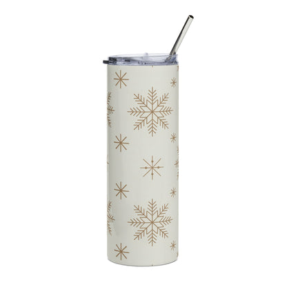 Cream tumbler with gold snowflake pattern and metal straw