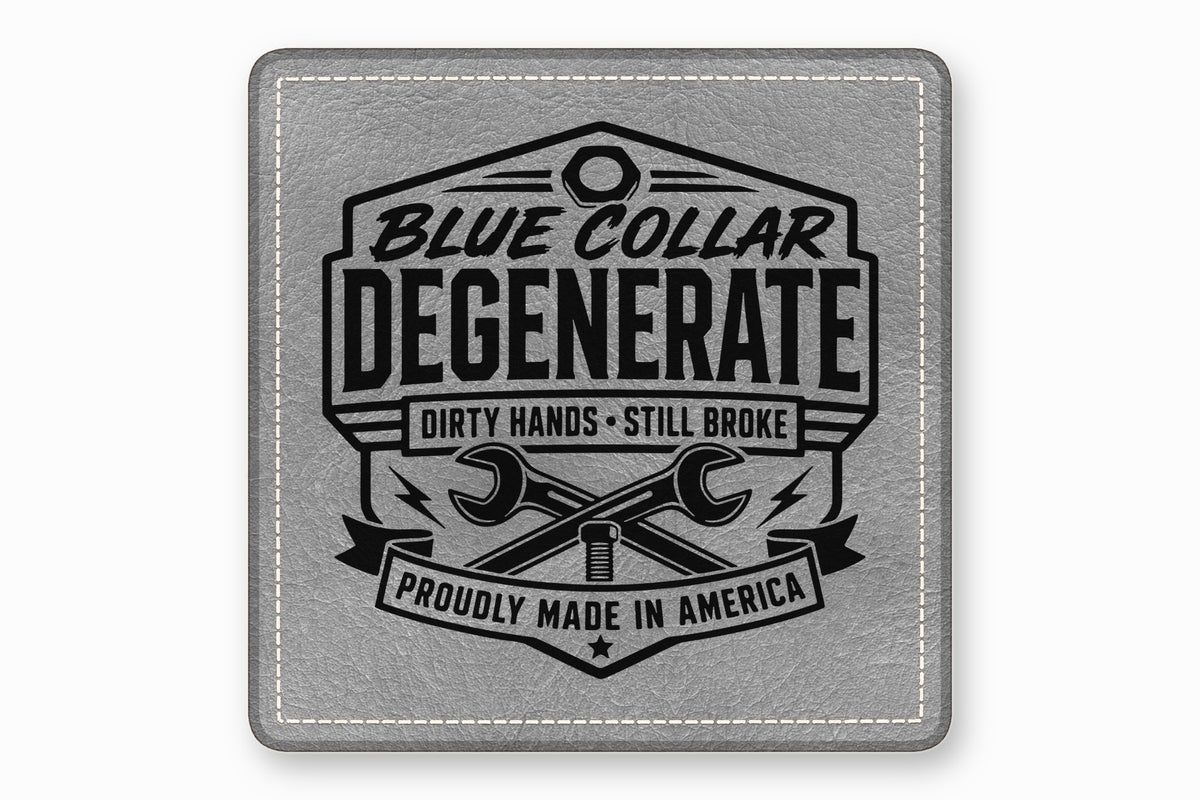 A square gray leather patch featuring a black embroidered design with crossed wrenches and text.