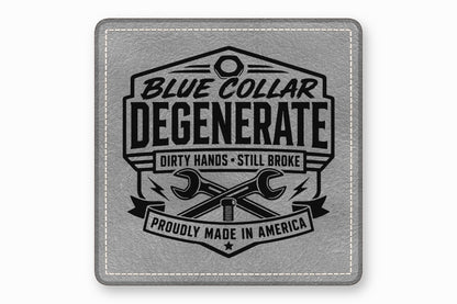 A square gray leather patch featuring a black embroidered design with crossed wrenches and text.