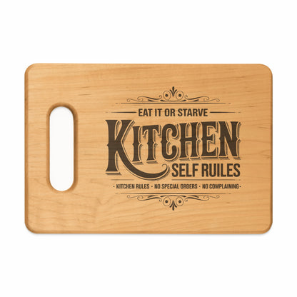 Light wood cutting board with "Kitchen Self Rules" and kitchen rules text.