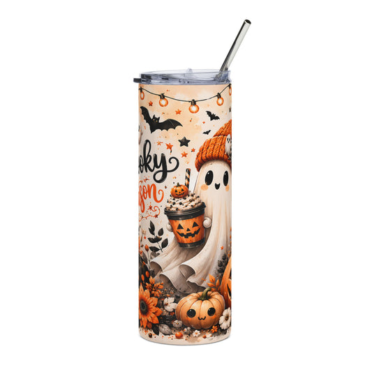 Tumbler with a cute ghost holding a pumpkin drink and Halloween decorations.