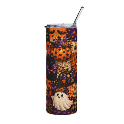 Tumbler with Halloween-themed patchwork pattern featuring pumpkins, a black cat, and a ghost.