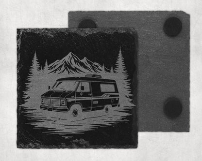 Slate coaster with etched image of van, trees, and mountains in a landscape.