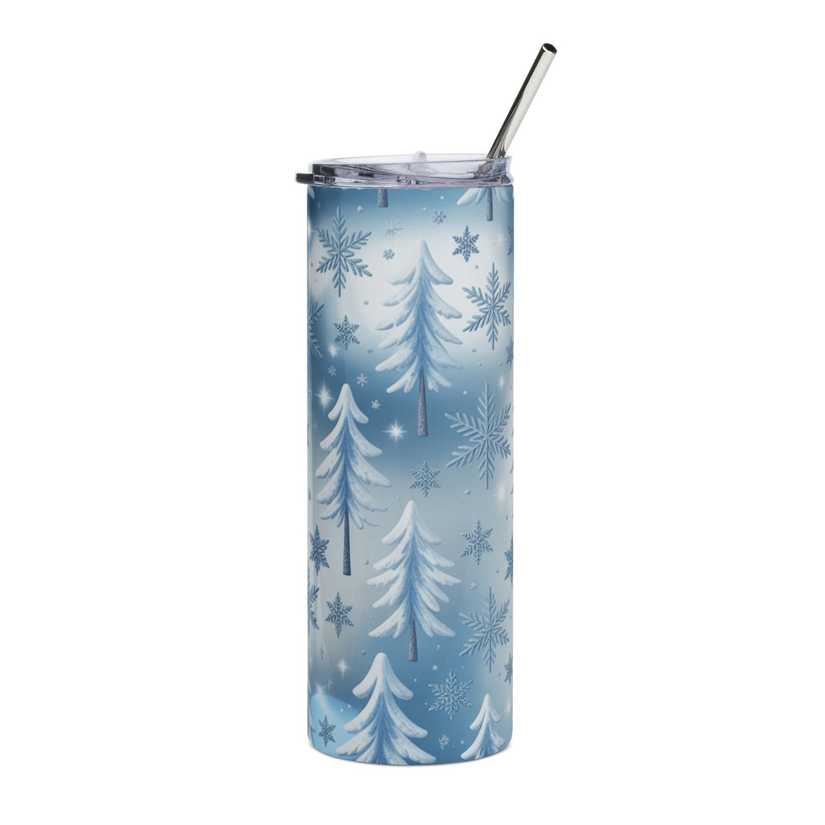Tall tumbler with winter trees and snowflakes pattern and metal straw.