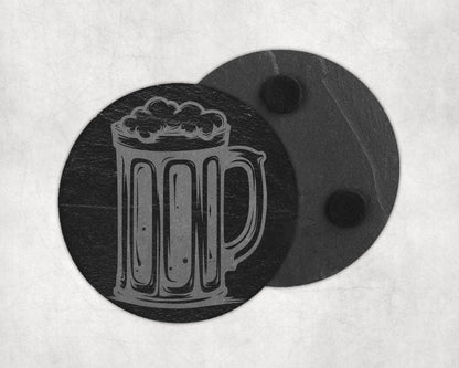 Slate coaster with etched beer mug design on textured background.