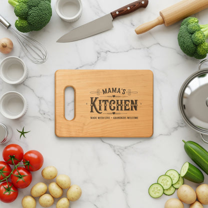 Wooden cutting board with "Mama's Kitchen Made with Love Grandkids Welcome" engraving.