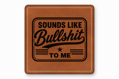 Square brown leather patch with white stitched border and the engraved text Sounds Like Bullshit to Me.