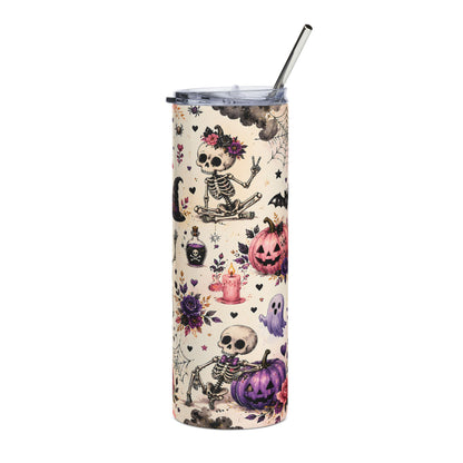 Tumbler with Halloween skeletons, pumpkins, ghosts, potion bottle, and flowers.