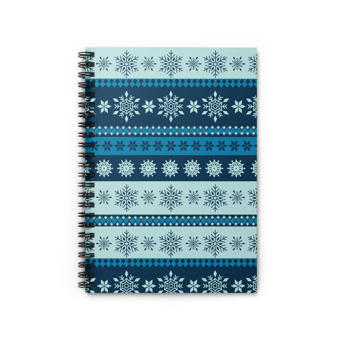 Spiral notebook with navy and light blue snowflake and diamond patterned cover.