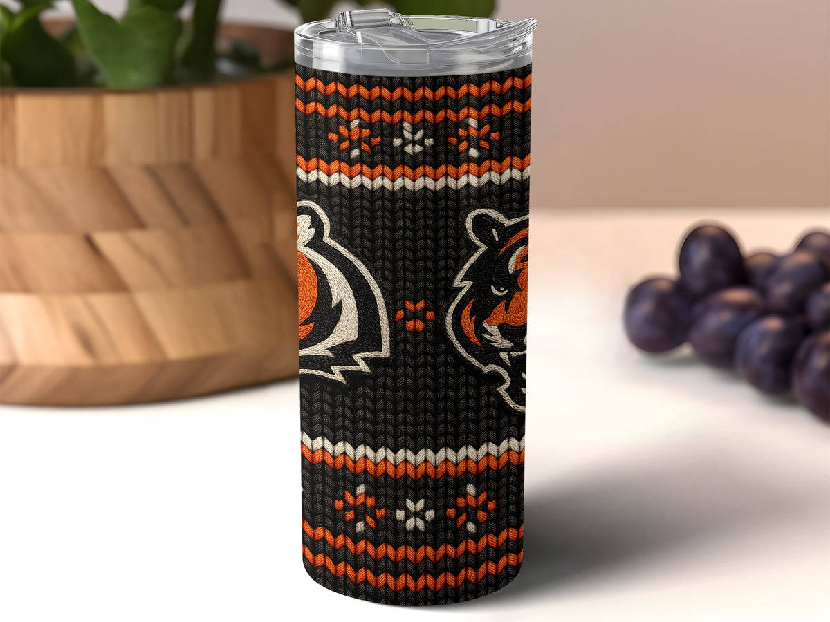 Black tumbler with orange tiger graphics and knit pattern.