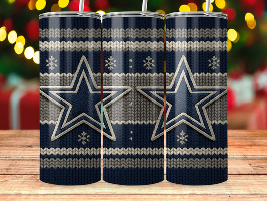 Three tumblers with a navy blue, gray, and white knitted pattern and stars.