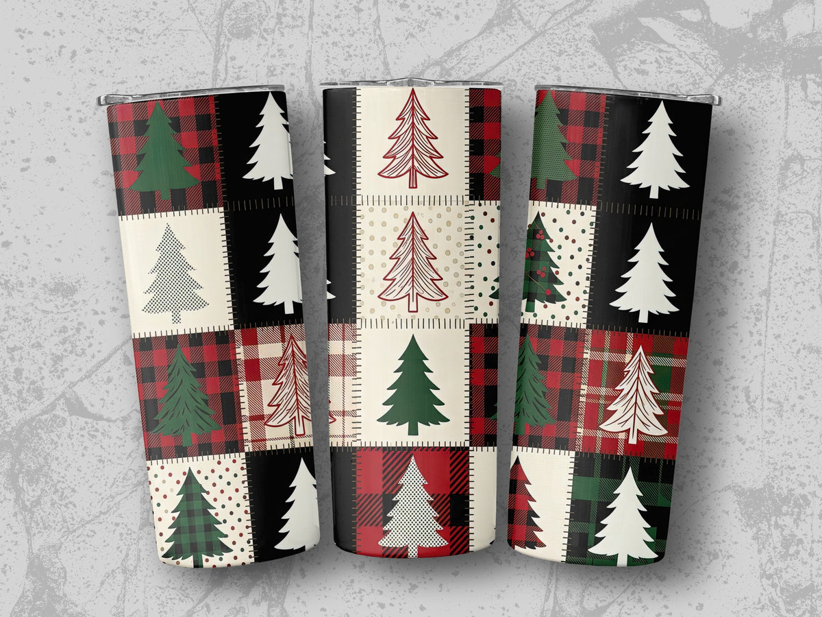 Three tumblers with a patchwork Christmas tree design on a grey background.