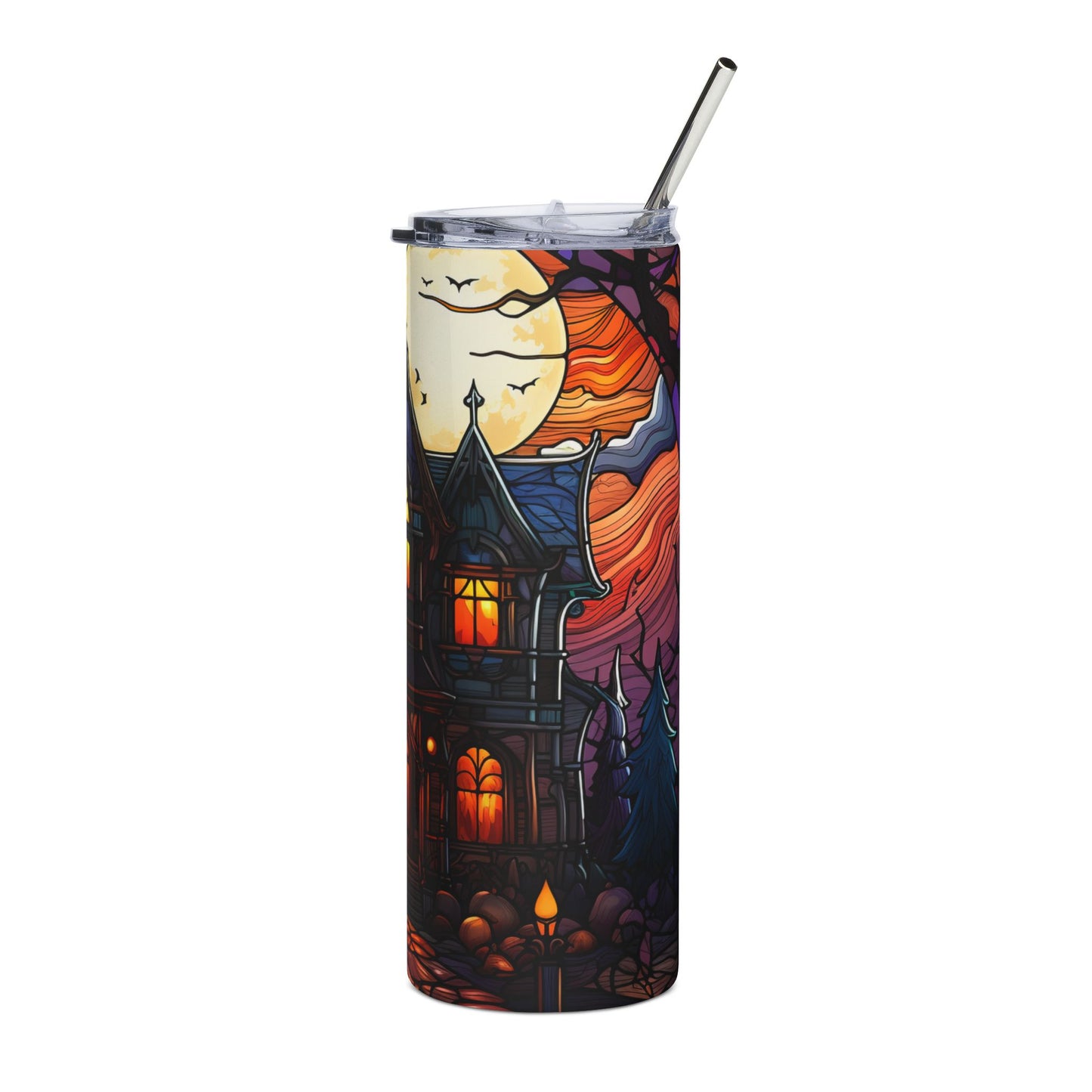 Tumbler with haunted house, moon, and bats Halloween design and a metal straw.