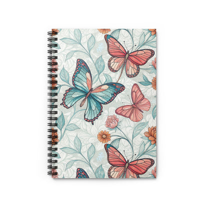 Spiral notebook with butterflies and floral pattern on cover.