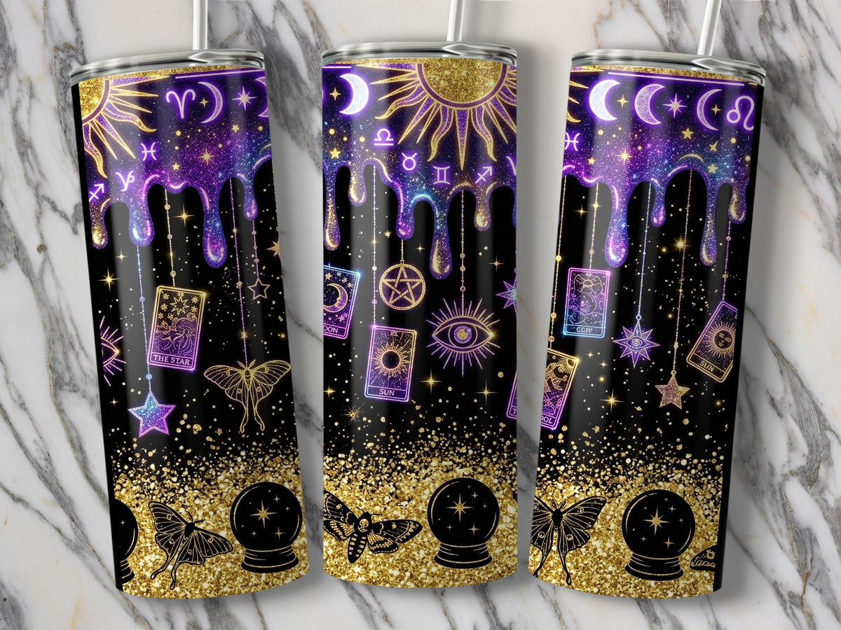 Three tumblers with celestial and tarot designs on a marble background.