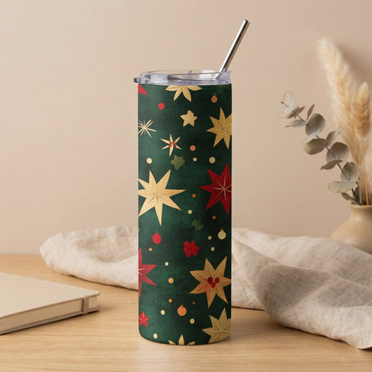 Green tumbler with a pattern of red and gold stars and festive ornaments.