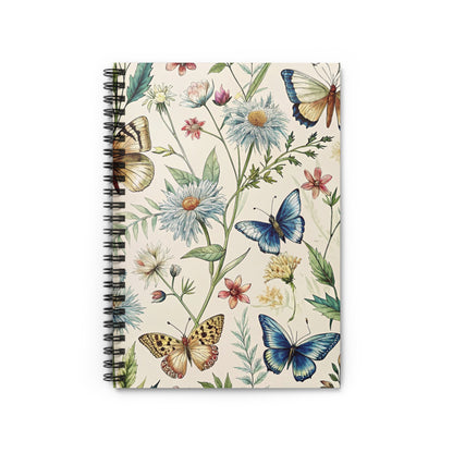 Notebook with a cream cover featuring a vintage botanical illustration of butterflies and flowers.