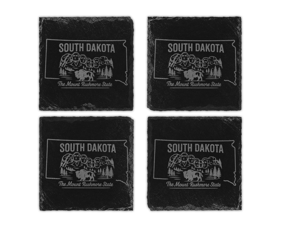 Four South Dakota slate coasters etched with Mount Rushmore and buffalo graphic.